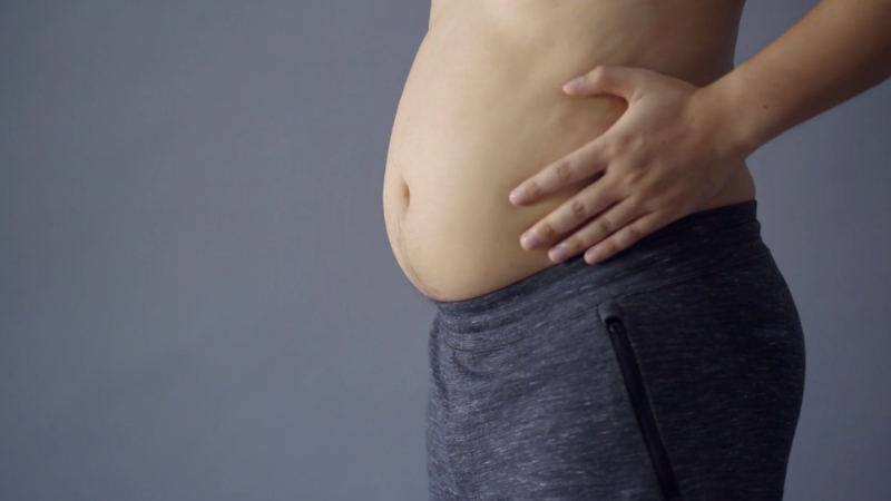 Image showing a man with increased abdominal fat, a common pattern linked to low testosterone levels